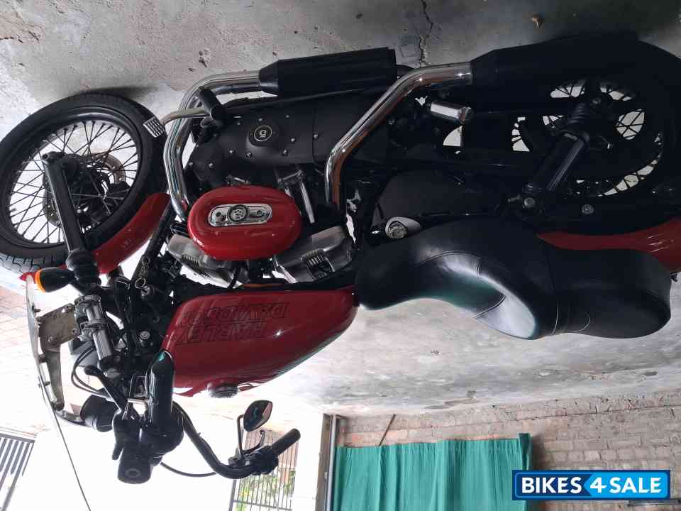 Red Harley Davidson XL1200N  Nightster