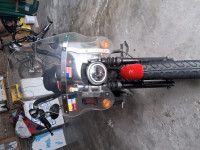 Red Harley Davidson XL1200N Nightster