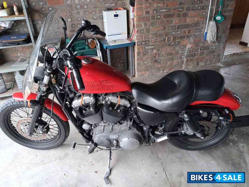 Red Harley Davidson XL1200N  Nightster
