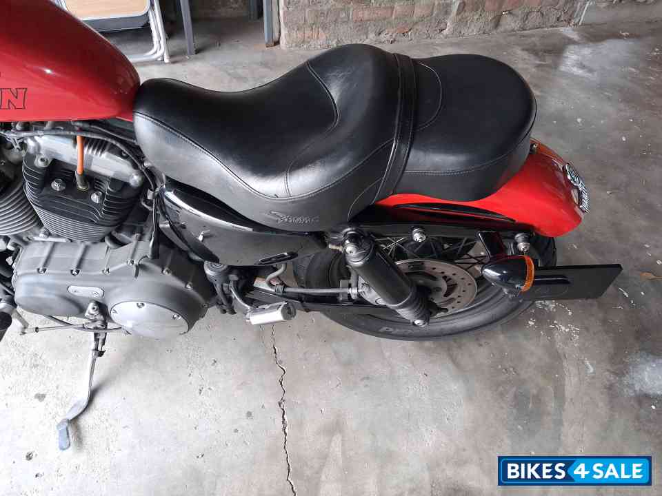 Red Harley Davidson XL1200N  Nightster