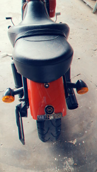 Red Harley Davidson XL1200N Nightster