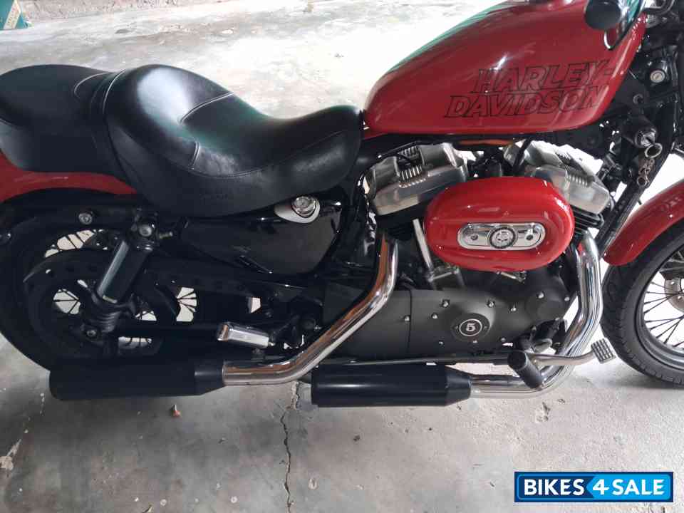 Red Harley Davidson XL1200N  Nightster