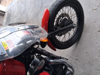 Red Harley Davidson XL1200N Nightster